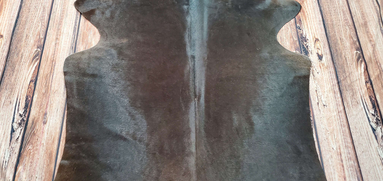 Beautiful cowhide rug, tan-black and of high quality! Great addition to our living room.
