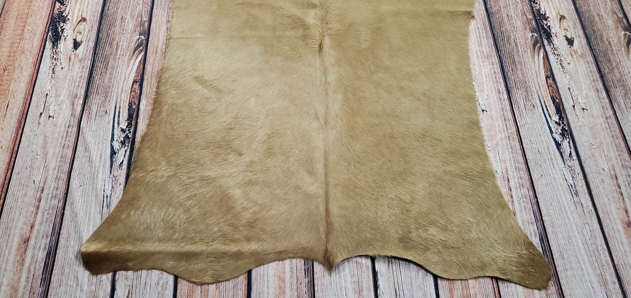 This leather real cowhide looks stunning, and it is quite effective in completing any room. It's the optimal size, too!

