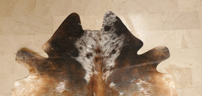 The small size cowhide rug is perfect for smaller spaces, and the light color is perfect for brightening up a room.