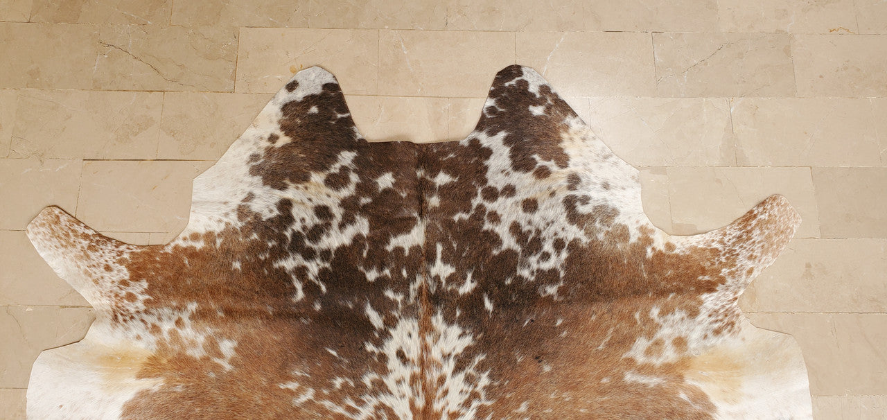 The natural colors of the cowhide Canada are versatile enough to match any existing furniture or decor, adding a rustic touch while remaining tasteful.
