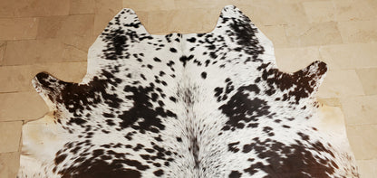 An extra small cowhide rug is a perfect way to add a touch of luxury to your home. These rugs are mostly beige with stripes and are hand finished to perfection
