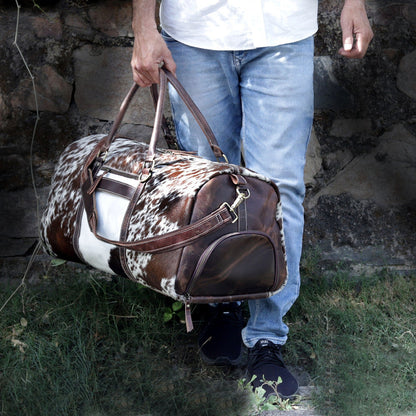 Upgrade your travel gear with our tricolor cowhide travel bag—meticulously crafted, spacious, and perfect for any journey