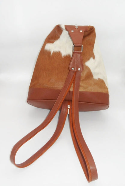 Step up your fashion game with our trendy cowhide bags. Add a touch of sophistication to any outfit with these fashionable and practical accessories.