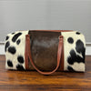 Set Of Cowhide Duffle Bags