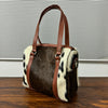 Set Of Cowhide Duffle Bags