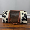 Set Of Cowhide Duffle Bags