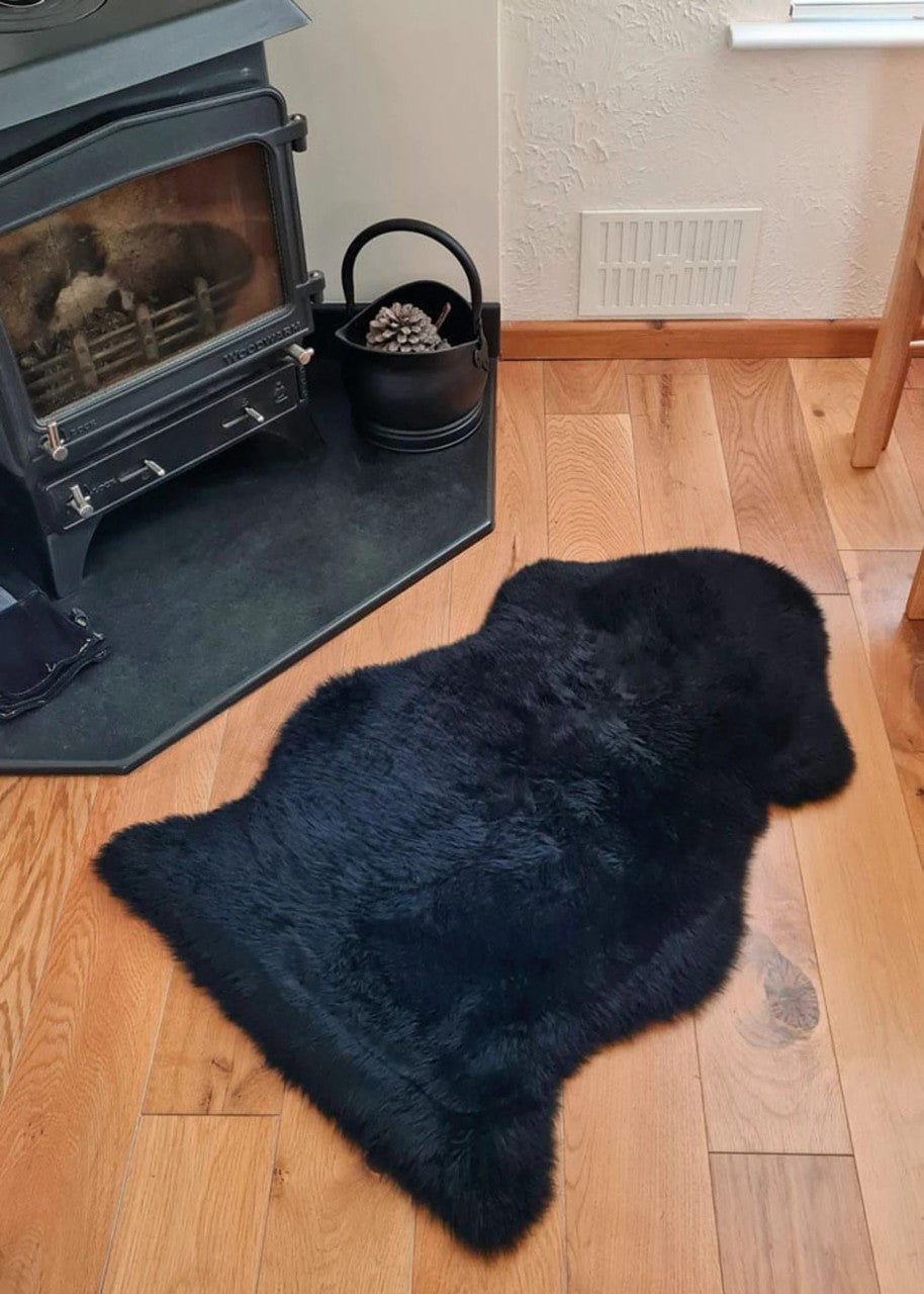 Transform your home into a haven of elegance with our premium black sheepskin rugs. Experience unparalleled comfort and timeless sophistication.