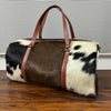 Set Of Cowhide Duffle Bags