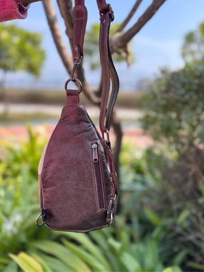Cowhide sling bag with adjustable leather shoulder strap