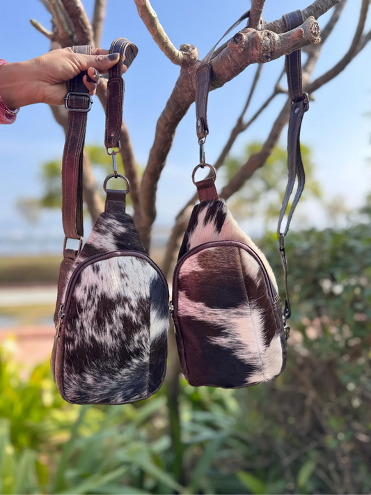 Cowhide sling bag with adjustable leather shoulder strap