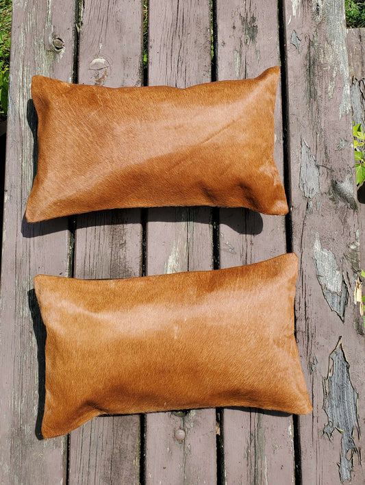 Loving this natural gorgeous cowhide lumbar pillow cover ! Looks even better in person, this will complete a mancave easily 

