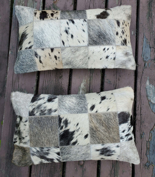 These lumbar cowhide pillows are gorgeous, the most beautiful shade of black grey cowhide fabric and very well made. 
