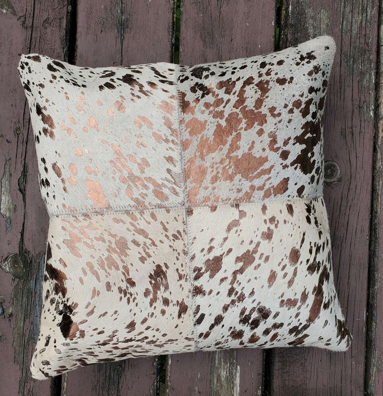 These cowhide pillow are exactly shown, work is of highest quality and the metallic cowhide is very attractive. It looks just like the photo. 

