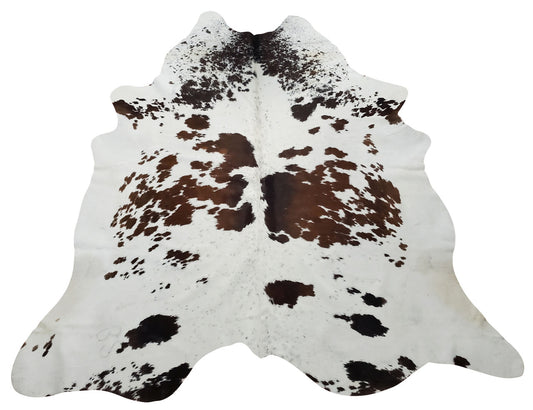 This medium cowhide rug looks great and spotted brown white add colors to any interior, great for upholstery or draped over any furniture.