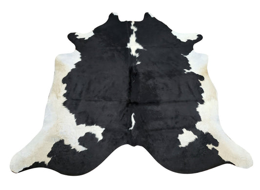 Everyone loves large holstein cowhide rug, the quality is amazing and solid black white shines like a beauty, this rug will be the talking point. 