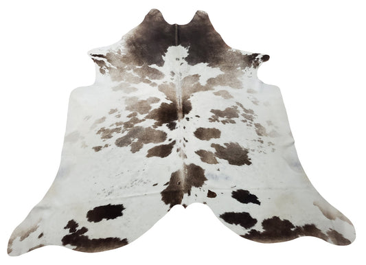 One of a kind grey black white cowhide rug, its absolutely gorgeous, suits any room and fits perfectly. 