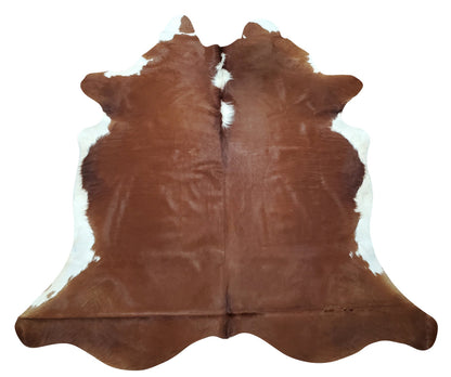 You will be super happy with this real cowhide rug, its has great brown and white colors, its vibrant and makes the room super cozy. 