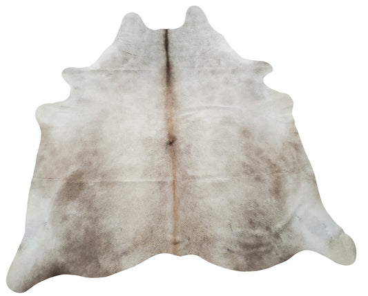 This grey champagne cowhide rug will bring depth and earthiness to your space, it is soft, velvety and this cowhide will be the perfect centerpiece.