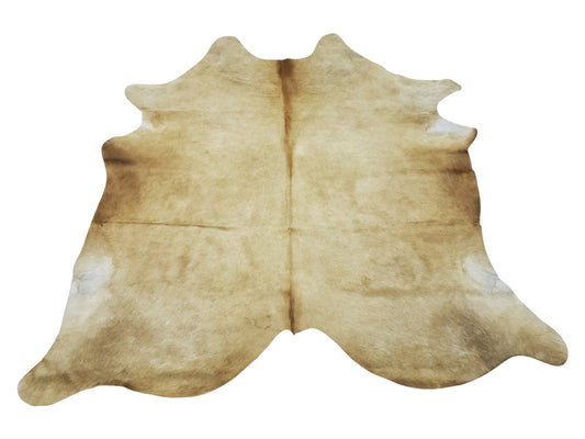 Add a cowhide rug to your work from home decor and Palomino is the perfect shade to give your space more groovy and interesting style. 
