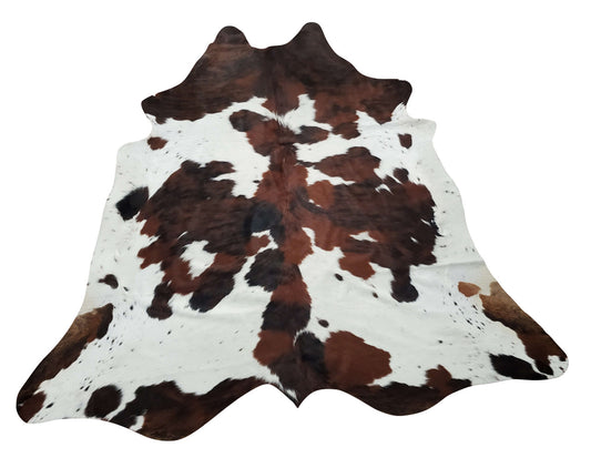 Our new cowhide rug with exotic brown and black spotted and white edges, this cowhide rug will be a perfect match for any room and pets will love it.