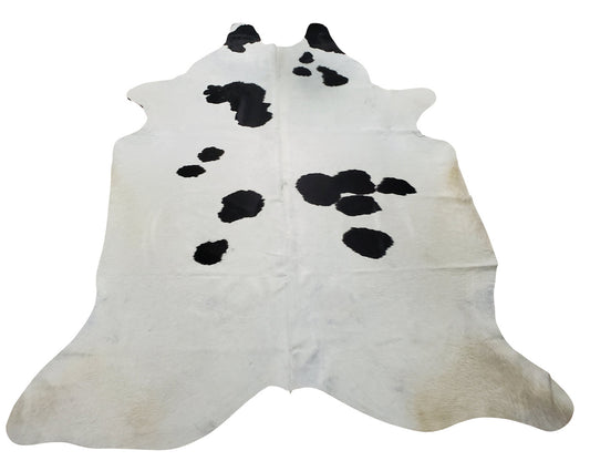 A unique black and white cowhide rug perfect for any classic or modern living room, these cowhide rugs are great for high traffic areas