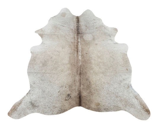 Tan shade cowhide rugs are perfect for interiors with busy furniture or layered with other rugs, these are selected for natural and real markings.