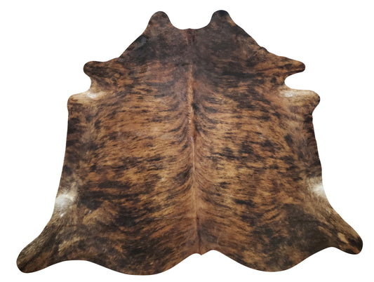 A very high quality and cute brindle cowhide rug in a unique mix of dark brown and black, animals love it and great for high traffic areas. 