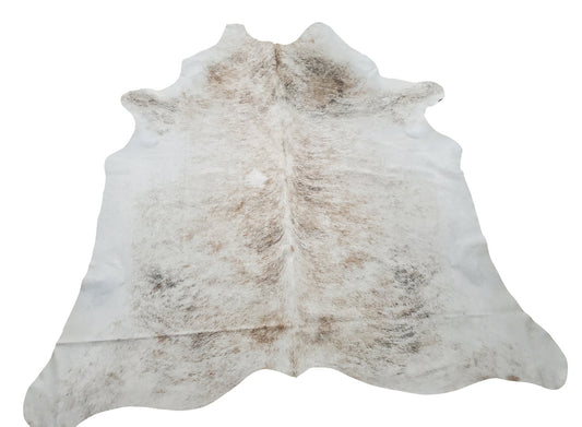 Large western cowhide rug in unique grey with some white perfect for your dining or family room.
