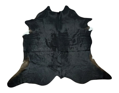 With its simple yet sophisticated design, this cow rug can be the perfect accent piece for your living space. The black cowhide rug’s natural look adds a softness to the room while providing an interesting texture contrast against other furniture items.