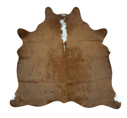 No need to pull out thousands of dollars this 3 x5 cowhide rug would look gorgeous in a bedroom.