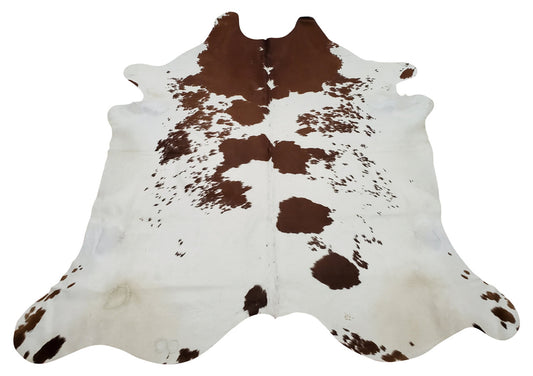 A cowhide rug to use for any event or space and you will love the natural marking, it will fit in almost any room, this brown white is gorgeous and huge.
