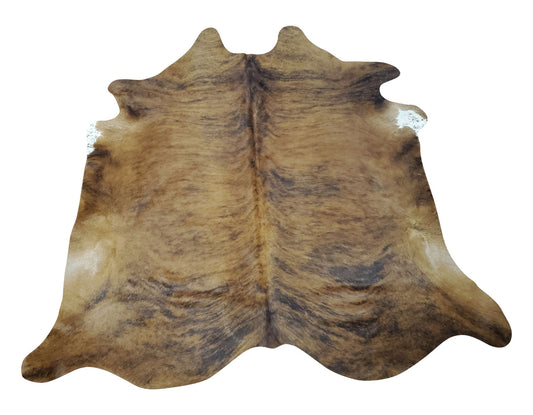 You will love this tan grey cowhide rug, no shedding or any smell, it will add a lot of character to your living room and big enough in front on fireplace