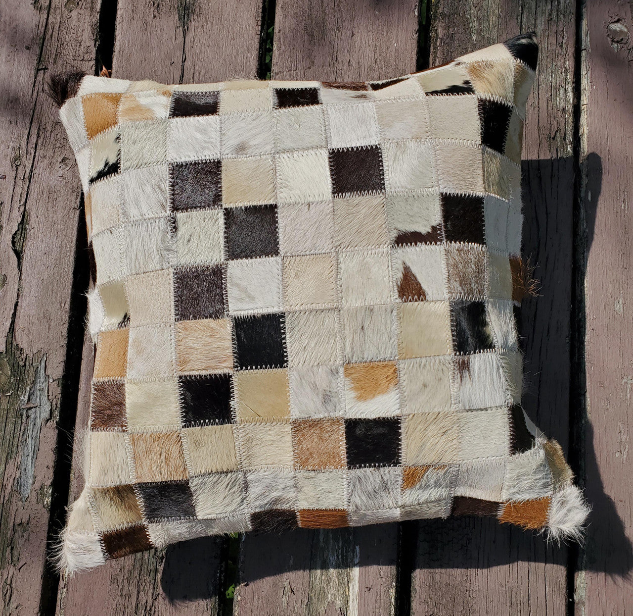 These cowhide pillow covers are made with exceptional craftsmanship , this is one of a kind natural cow skin in patchwork. 