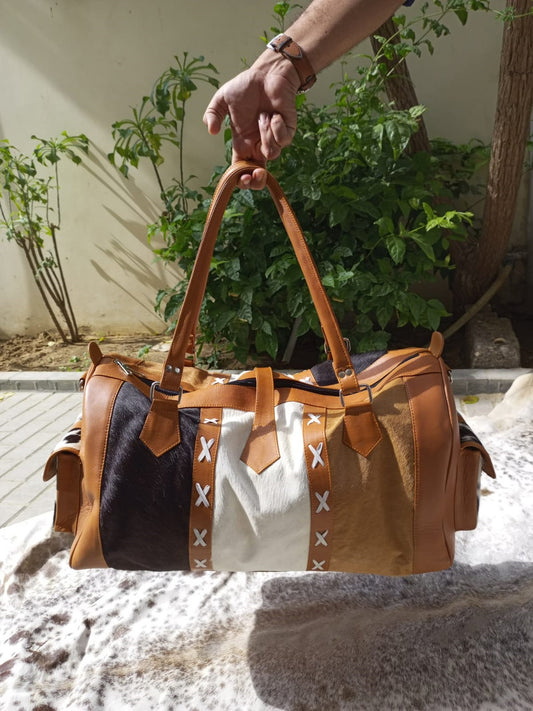 Custom cowhide duffle bags elevate your travel style. Perfect for backpacking and weekend getaways. Crafted with care for your next adventure!