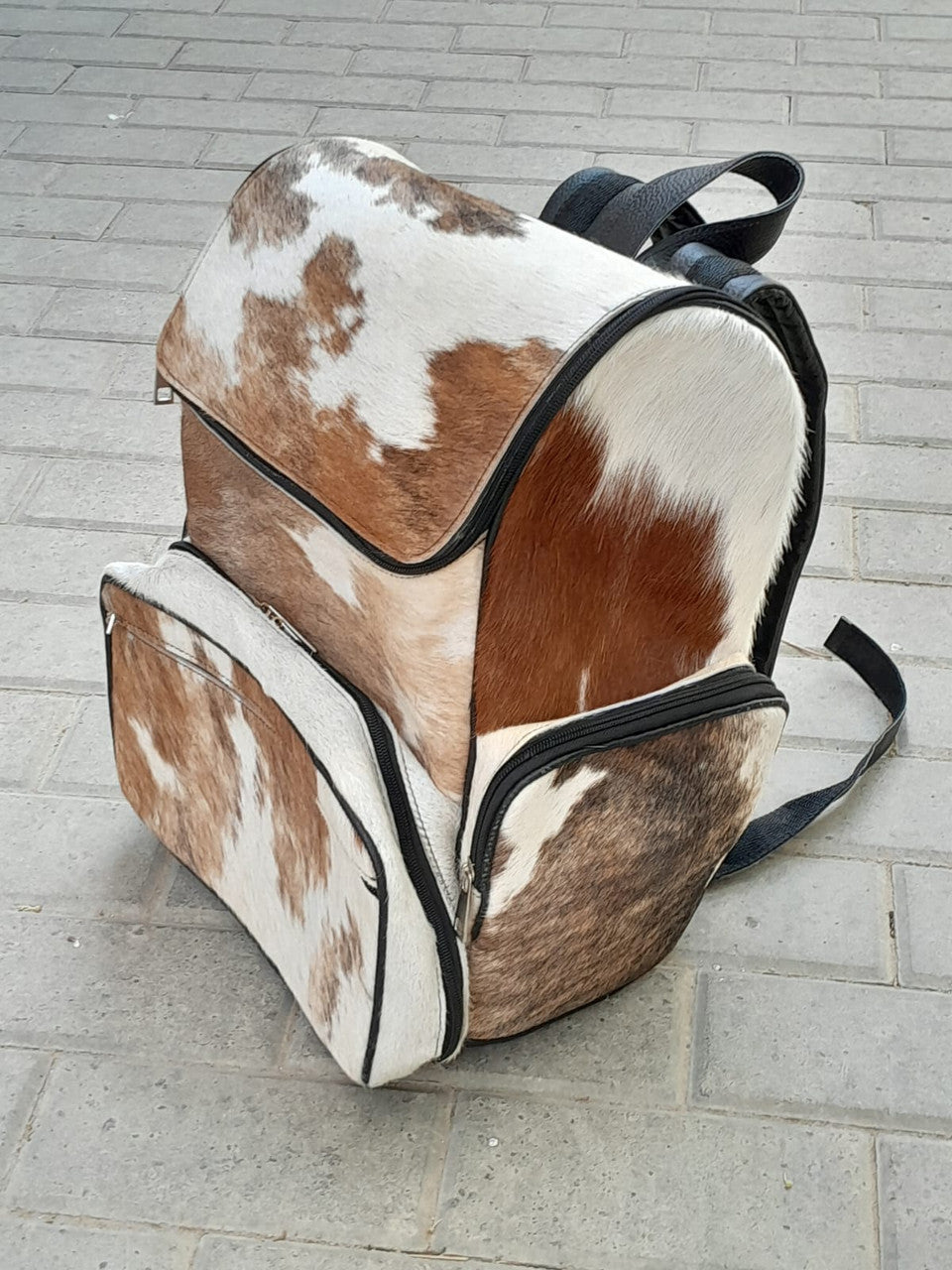 Discover the perfect blend of style and functionality with our cowhide backpacks. Shop now for high-quality, durable designs.