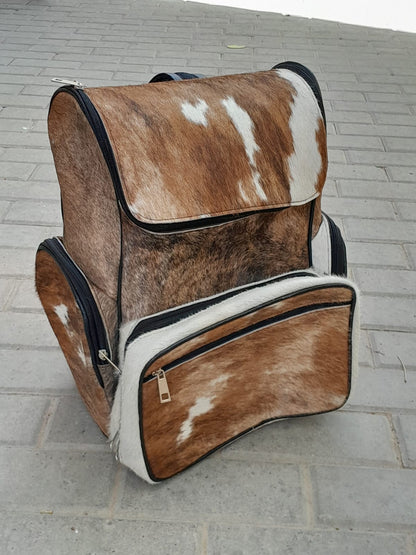 Experience the ultimate in style and durability with our cowhide backpacks. Shop now to add a touch of sophistication to your look.