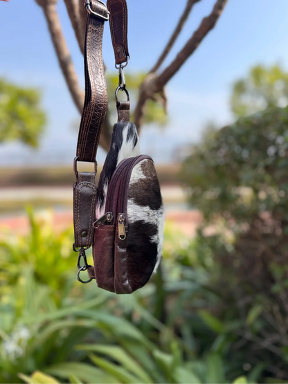 Cowhide sling bag with adjustable leather shoulder strap