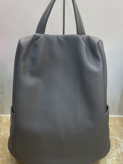 Women leather tote bag with backpack straps, large interior space, clean shape for work, school, and trips