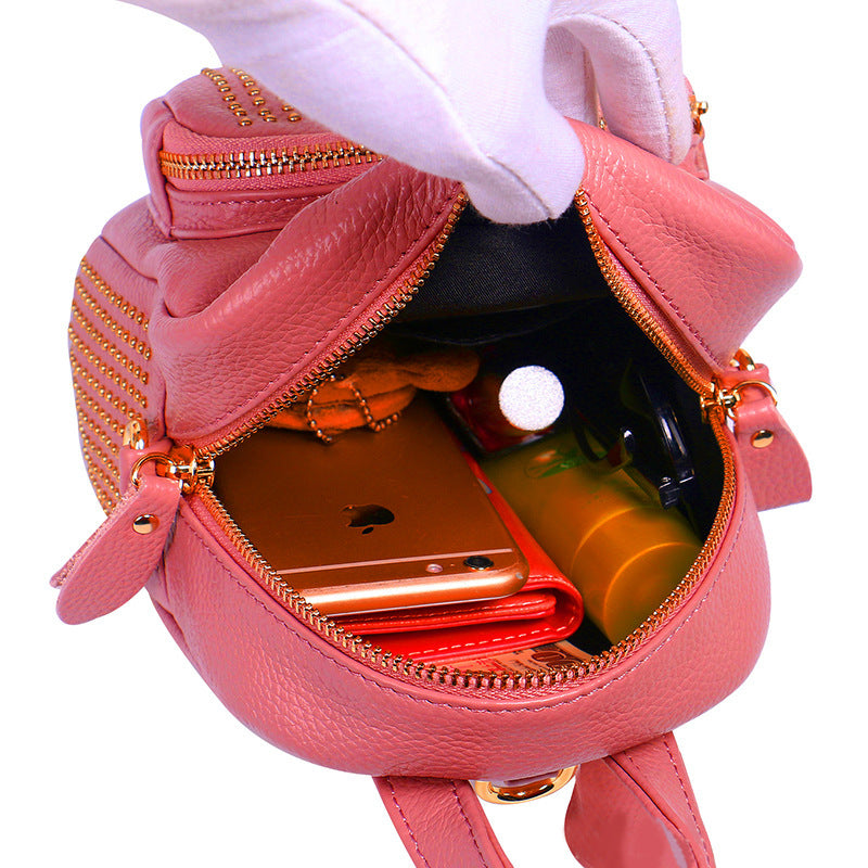 Pink studded top-grain leather mini backpack