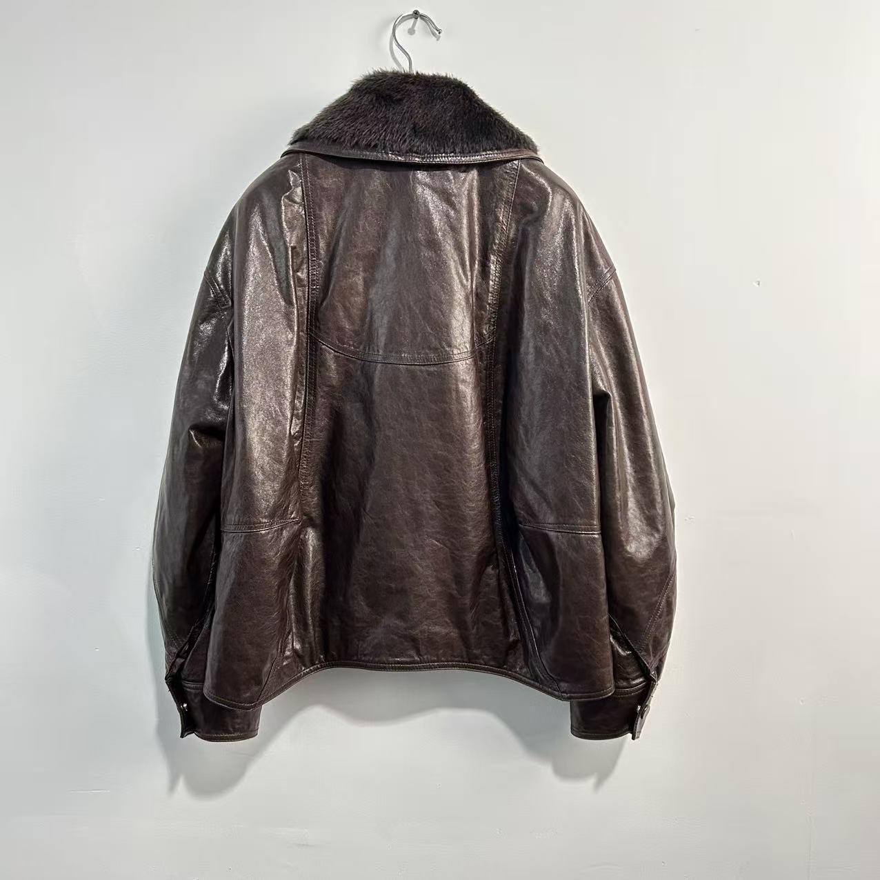 Women leather parka with fur collar