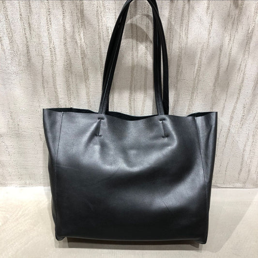 Genuine leather tote bag for women with large capacity, shoulder carry design, and clean structured shape