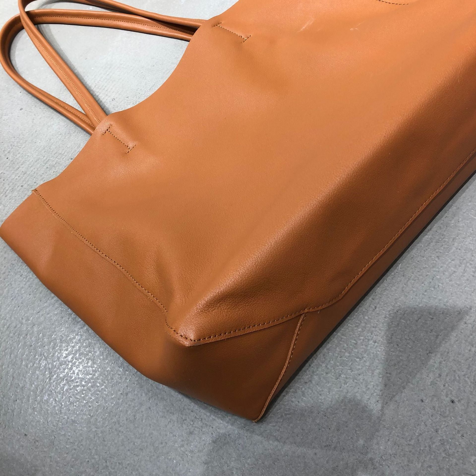 Everyday women leather tote bag with simple silhouette and spacious open compartment