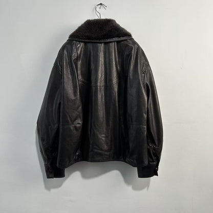 Women leather parka with fur collar