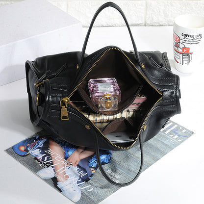 Leather shoulder crossbody bag for women with adjustable strap and compact commuter friendly size