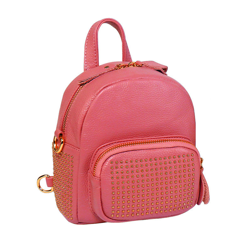 Pink studded top-grain leather mini backpack