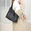 Soft brown leather messenger bag for women