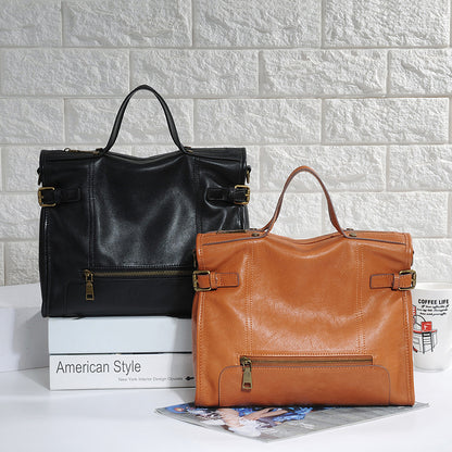 Genuine leather crossbody bag for women built for everyday use with front pocket and wide opening design