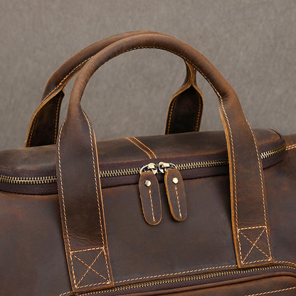 Full grain leather travel duffel with adjustable shoulder strap and balanced structure