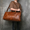 Large leather duffle bag with shoe section