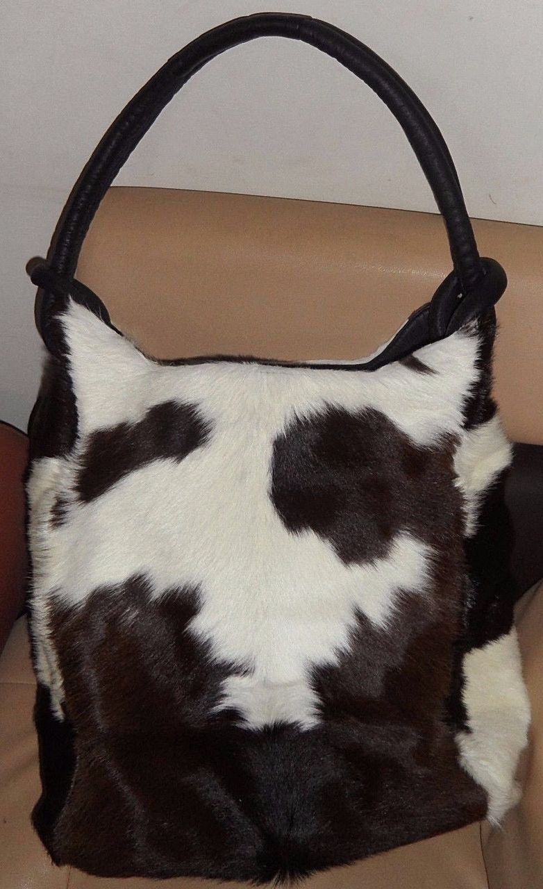 Solid Black White Cowhide Shoulder Bag.